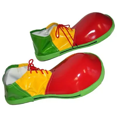 Фотография клоунских ботинок на ярком фоне