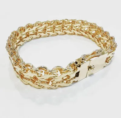 Изображение роскошного браслета на руку золотистого цвета: высокое качество в формате JPG