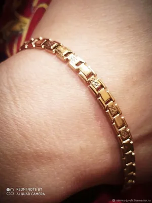 Фотография элегантного золотого браслета на руку: скачать в формате JPG