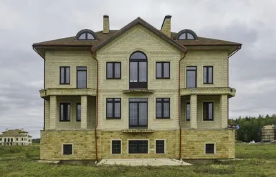 Фотографии фасадов домов с наружной отделкой панелями NICHIHA