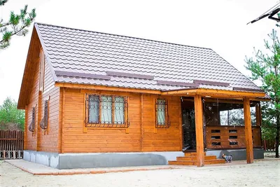➤ Деревянный дом из бруса с террасой ДД-09 под ключ в Минске