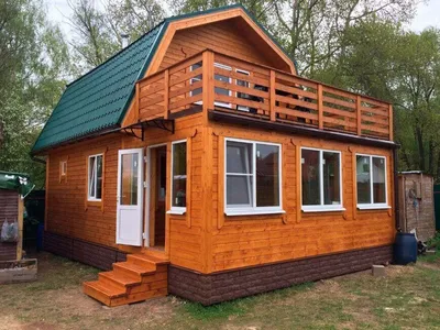 ✓ Деревянный дом из термобруса с верандой 74,1 м2. от производителя Thermo  Wooden House 003 ➡ купить по лучшей цене в Киеве от компании \"Группа  компаний \"Промконтракт ЛТД\" Кредитование строительства деревянных домов