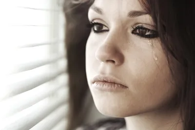 Девушка со слезами на глазах Stock Photo | Adobe Stock
