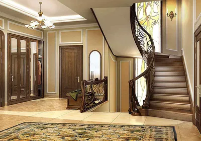 Интерьер прихожей и коридора в частном доме с лестницей