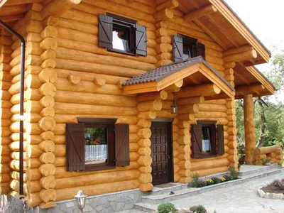 Проекты деревянных домов: дом из оцилиндрованного бревна 9.4х10.6