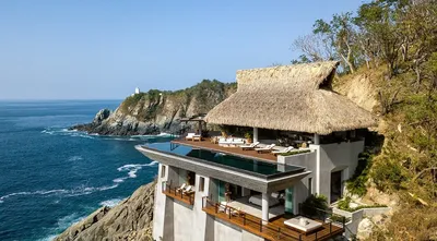 В Мексике построили дом посреди скал на берегу Тихого океана | ivd.ru