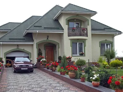 красивый дом с серой крышей из металлочерепицы | Bungalow house plans,  House designs exterior, House goals