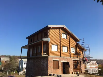 Как покрасить фасад деревянного дома