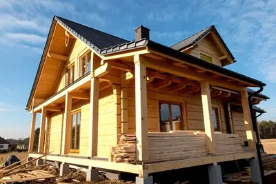 Этапы строительства деревянного дома из оцилиндрованного бревна  лиственницы, бруса