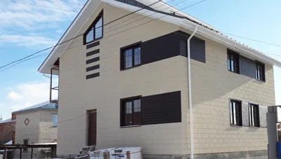 Каркасные дома с фасадом из бесшовного металлосайдинга: плюсы и минусы,  купить