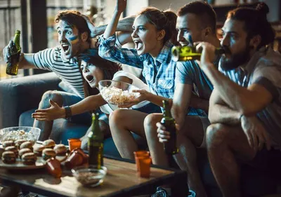 Beer with snack and ball Stock Photo by ©belchonock 131342840