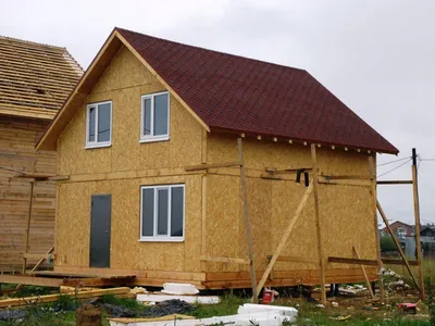 ᐈ Строительство двухэтажного дома с гаражом из СИП панелей