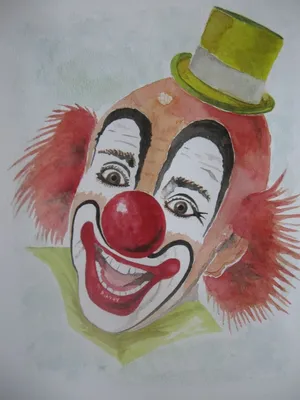 Фото клоуна с большим красным носом