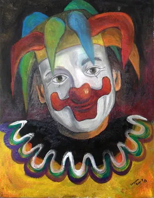 Клоун с кисточками и красками на фотографии