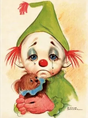 Фотография грустного клоуна с рождественским украшением