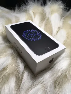 Изображение руки, держащей iPhone 6