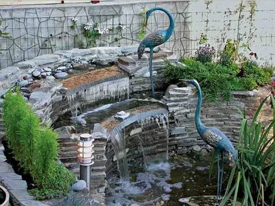 Декоративные искусственные водопады на искусственных и природных водоемах.  Создание садовых водопадов в Киеве