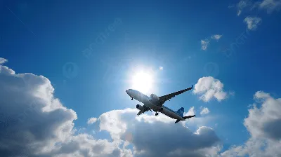 силуэт самолета, летящего в голубом небе с белыми облаками Стоковое Фото -  изображение насчитывающей самолета, муха: 216259618