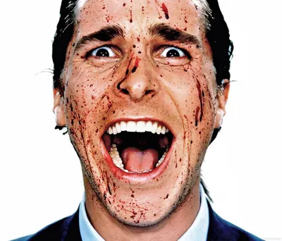 Портрет человека на Хэллоуин. Парень с истекающей кровью на лице. Страшный  грим стоковое фото ©efurorstudio 311937350