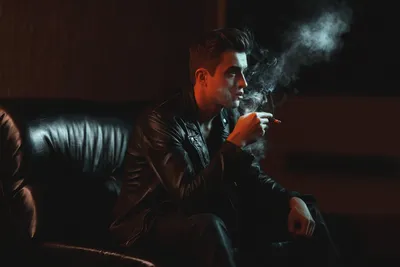 Молодой парень с сигаретой Stock Photo | Adobe Stock