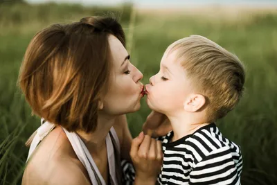 Close up kiss on girls cheek. Stock Photo by ©karelnoppe 9725440