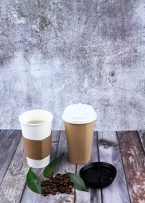 Чашка кофе с кофейными зернами на мешковине Stock-Foto | Adobe Stock