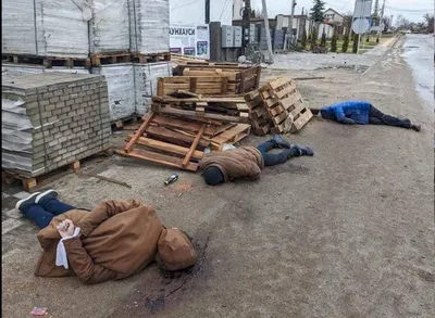 Тела со знаками пыток, трупы на улицах, братские могилы. Российские войска  оставили на Киевщине страшные следы