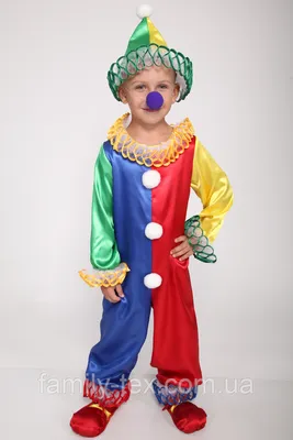 Клоун в ярком костюме на фотографии: фотография в высоком разрешении в формате JPG