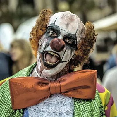 Ужасающая фотография Клоун убийца с кровью