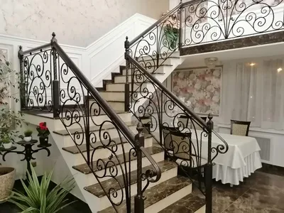 Кованые перила для лестницы в Челябинске от компании Лидер