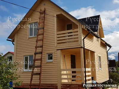 Проект дома из бруса 11х11 Русь с террасой и крышей с кукушкой: фото и цены.