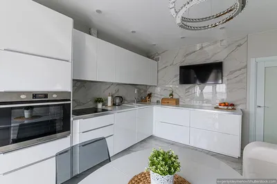 Белая угловая кухня с пластиковыми фасадами в стиле Хай-Тек c акриловой  столешницей за 356000 рублей от Кухнидар. Фото и проектная документация