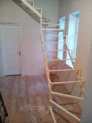 Изображение лестницы, которая подарит вашему дому неповторимый шарм