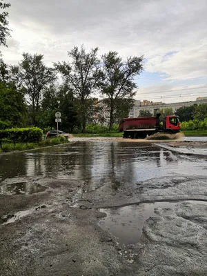 Фотография Лужа Дождь Вода Тротуар город Мокрые