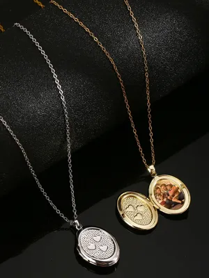 Медальон-сердечко, украшенный янтарной мозаикой в интернет-магазине янтаря