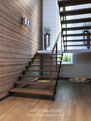 Лестница на металлическом каркасе с обшивкой ступеней деревом в частный дом  на 2 этаж