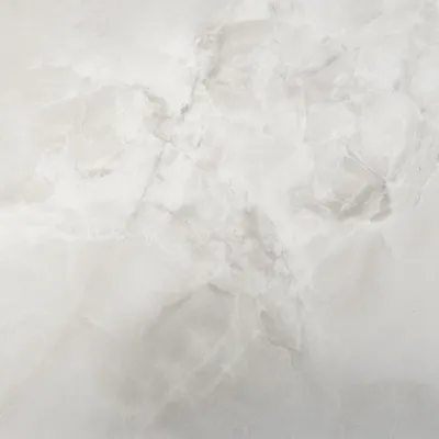 Мраморная плитка и слэбы из натурального мрамора Calacatta белого цвета
