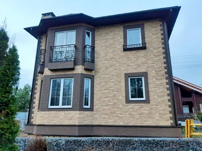 Отделка фундамента дома фасадными панелями, цена в Тюмени от компании Фасад  Сибири