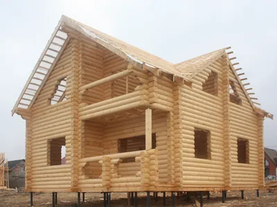 Проект дома из оцилиндрованного бревна 7,0 м x 9,0 м.