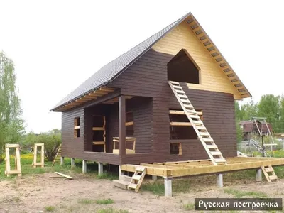 Как покрасить фасад деревянного дома