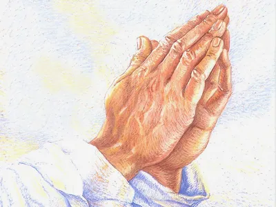 Фотография рук в молитве: символ любви и мира