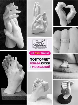 Фотография рук женщины, держащих кисти для макияжа