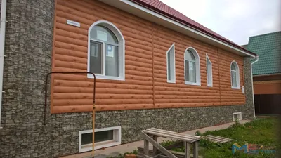 Отделка фасада деревянных домов сайдингом