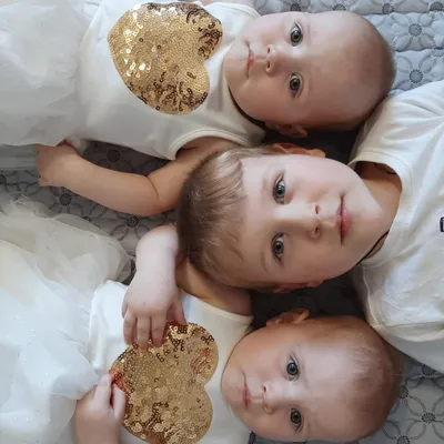 Young happy family at Christmas tree/ Mother and little boy and two girls  without father. Молодая семья отец, трое детей, мальчик и две девочки.  Stock Photo | Adobe Stock