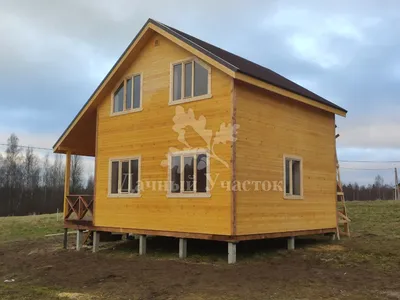 Проект каркасного дома 10х9 Вальмонт с террасой и сауной: фото и цены.
