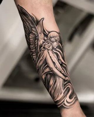 Фотка татуировки ангела на руке: WebP формат