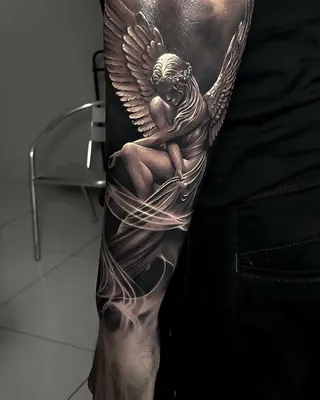 Фотка татуировки ангела на руке: средний размер