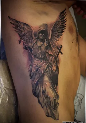 Татуировка ангела на руке в стиле граффити