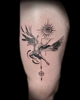 Татуировка ангела на руке с надписью