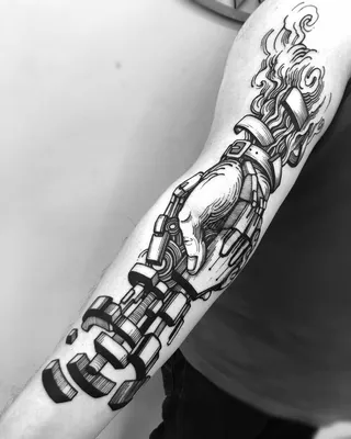 Фотография тату биомеханика на руке: татуировка для тех, кто готов к переменам